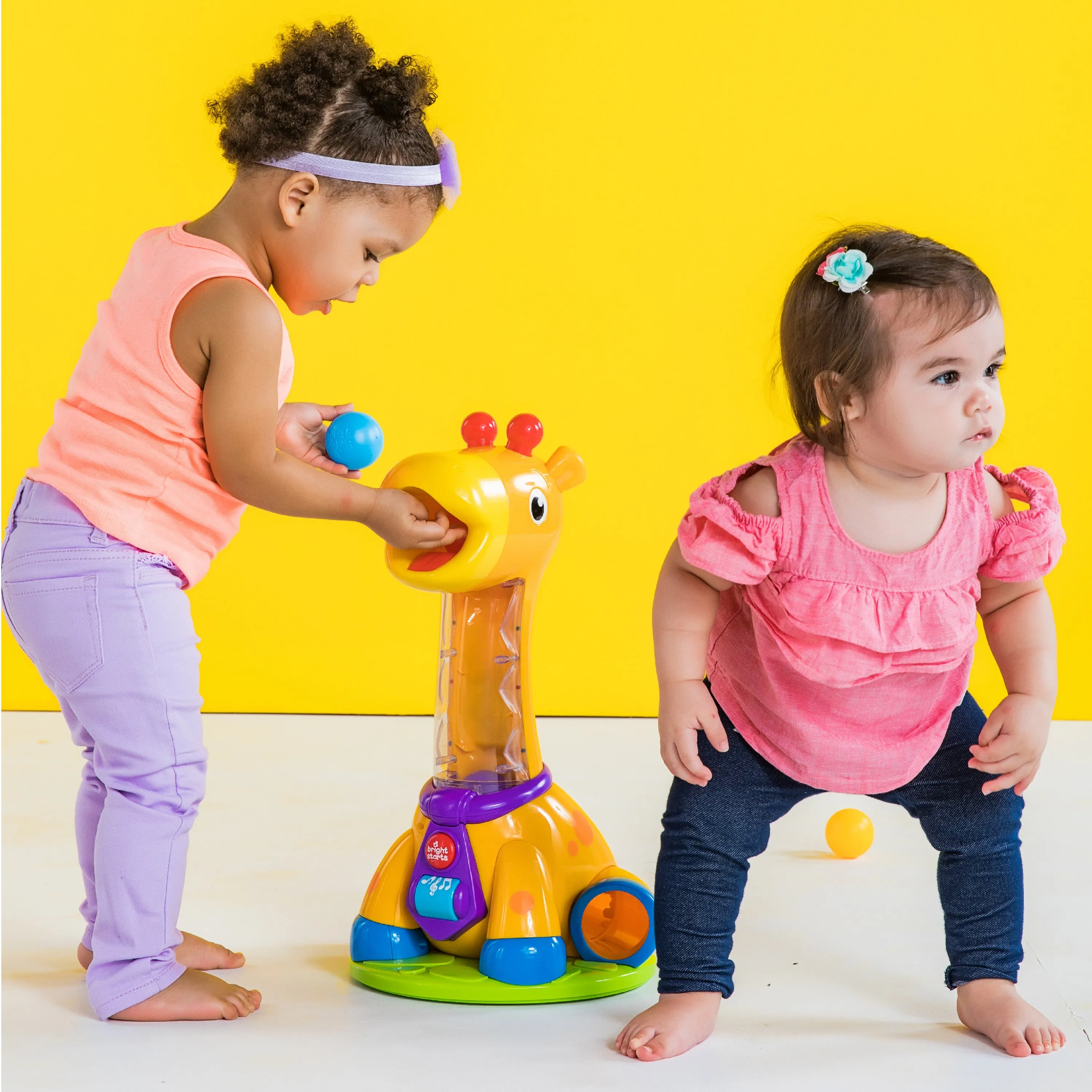 Bright Starts Spin & Giggle Giraffe Ball Popper Musical Baby & Toddler Toy